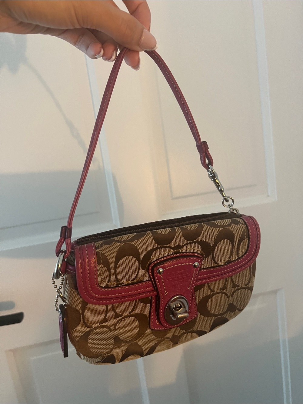 Coach Wristlest- Signature Canvas with Pink Trim